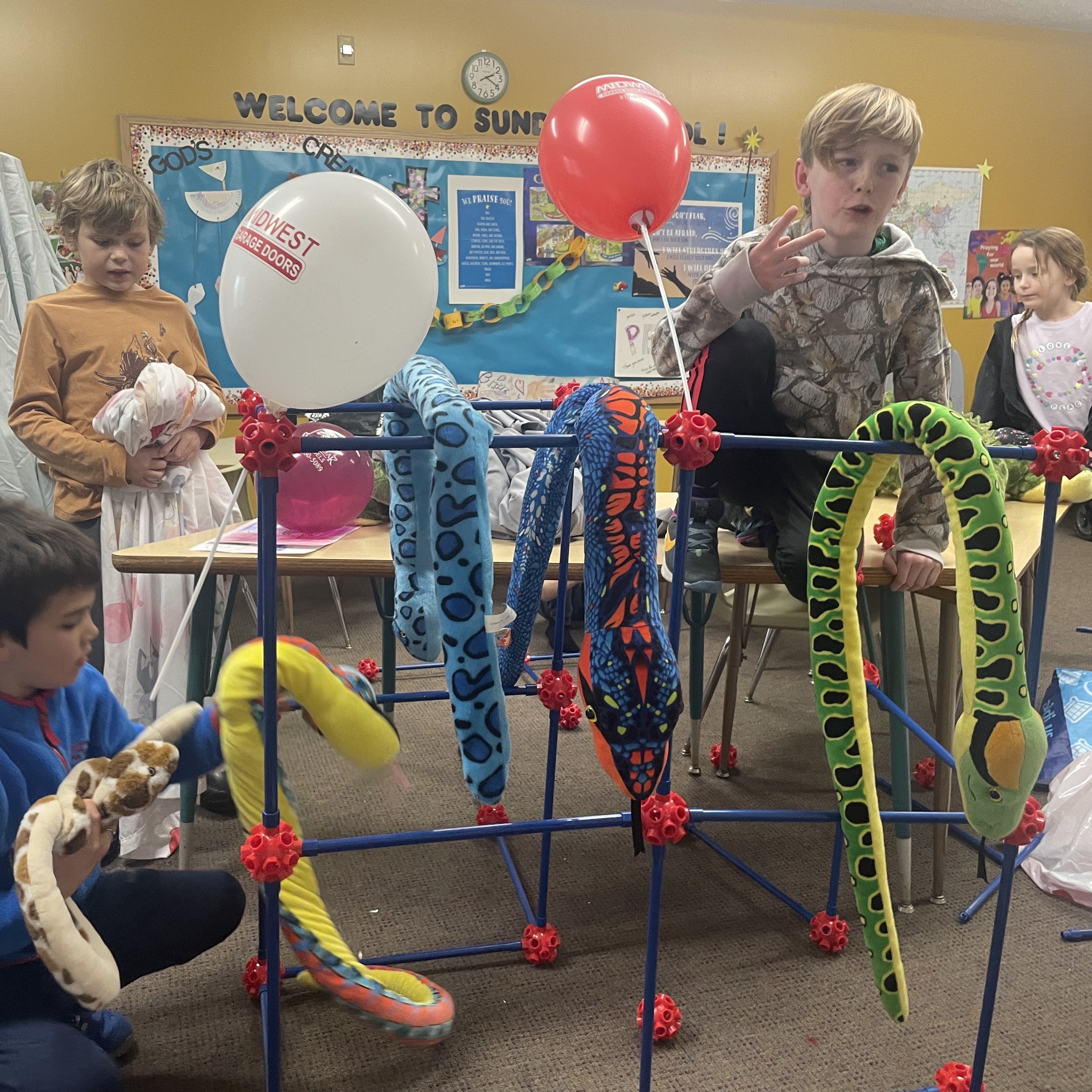 Kids building and playing during a hands-on co-op class